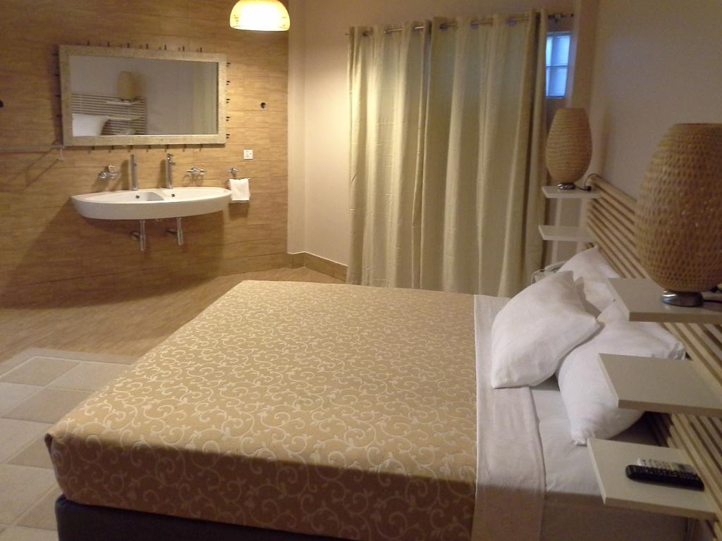 Tropical Enclave Hotel Acra Quarto foto