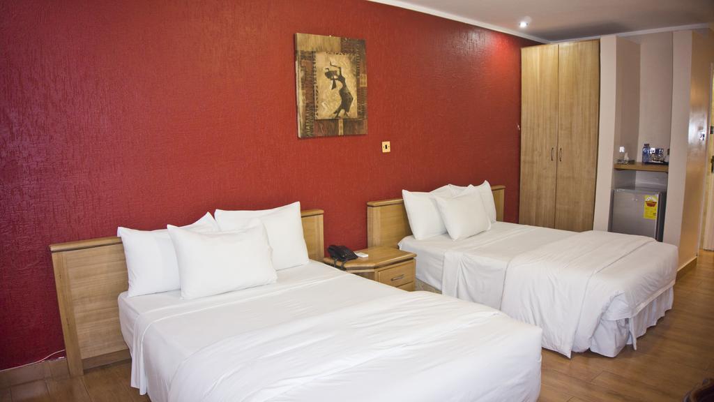 Tropical Enclave Hotel Acra Exterior foto